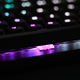 The RGB lighting on the K100 shines real bright.